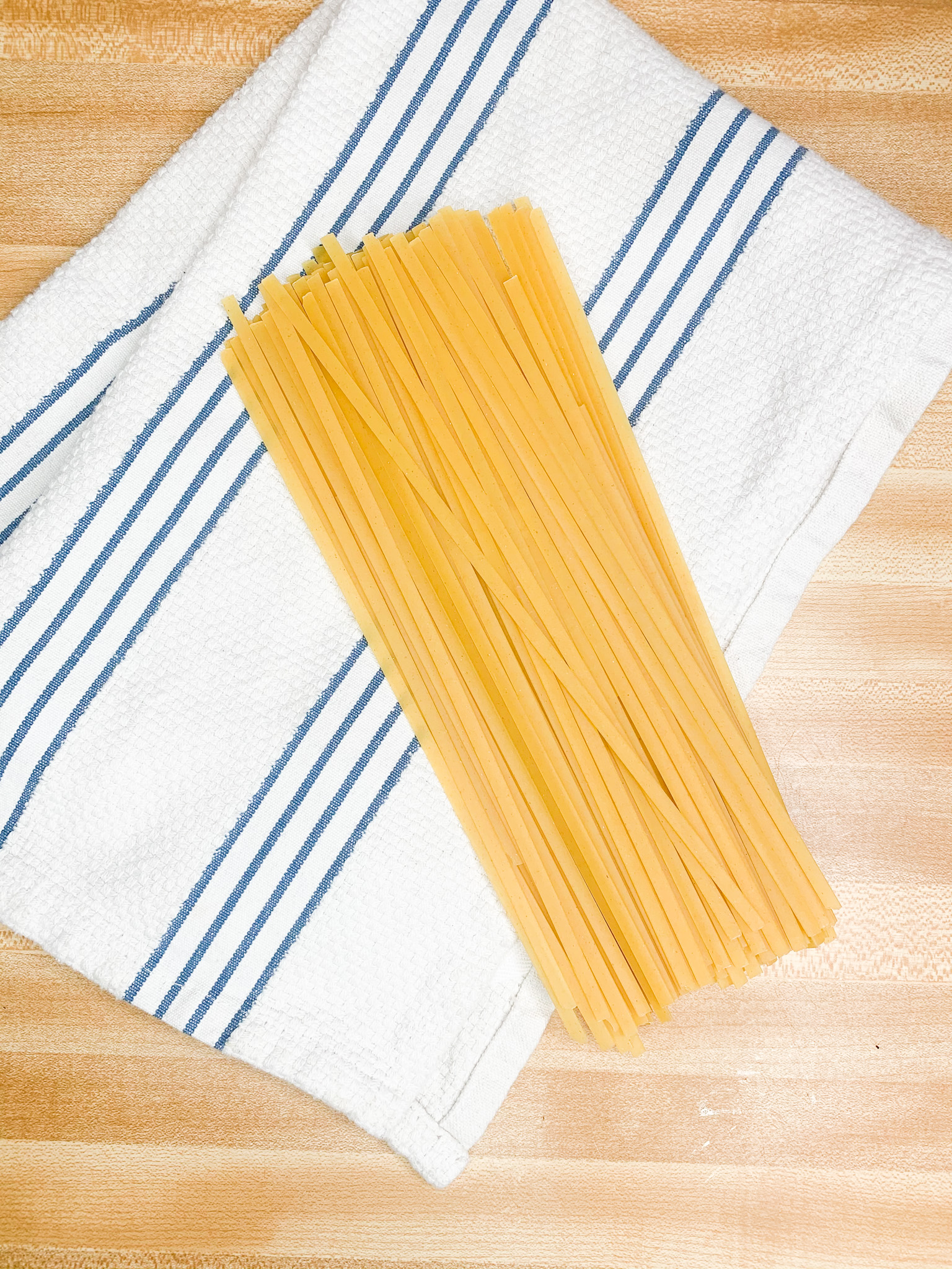 fettuccine noodles on a towel